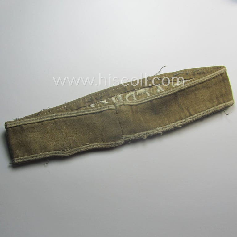 Cleary worn, WH cuff-title (ie. 'Ärmelstreifen') entitled: 'Afrika' (that bears a printed 'RbN.'-numeral!) being a minimally shortened example that comes in an overall very nice- (ie. issued and clearly worn ie. once tunic-attached-), condition