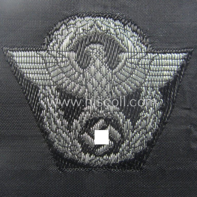 Attractive - and nowadays scarcely encountered! - police ie. 'Polizei'- (ie. 'SS-Polizei'-) flatwire 'BeVo'-woven, officers'-pattern cap-eagle (ie. 'Adler für Offiziers-Schiffchen o. Einheitsfeldmütze der Polizei o. SS-Polizei')