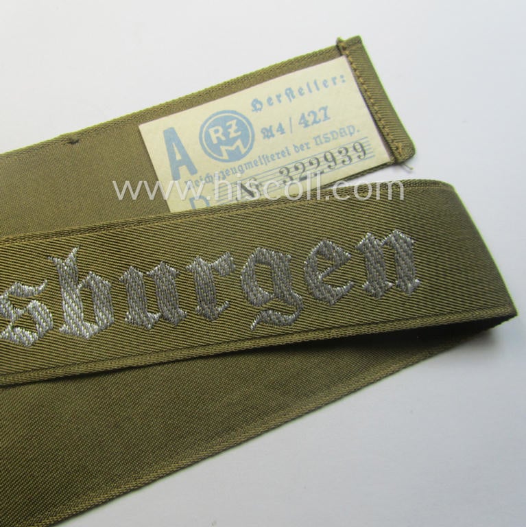 Superb - full length and 'flat-wire'-woven! - 'N.S.D.A.P.'- (ie. 'Politische Leiter'-) related cuff-title (ie. 'Ärmelstreifen') entitled: 'Ordensburgen' (being a 'virtually mint- ie. unissued' example that still retains its 'RzM'-etiket)