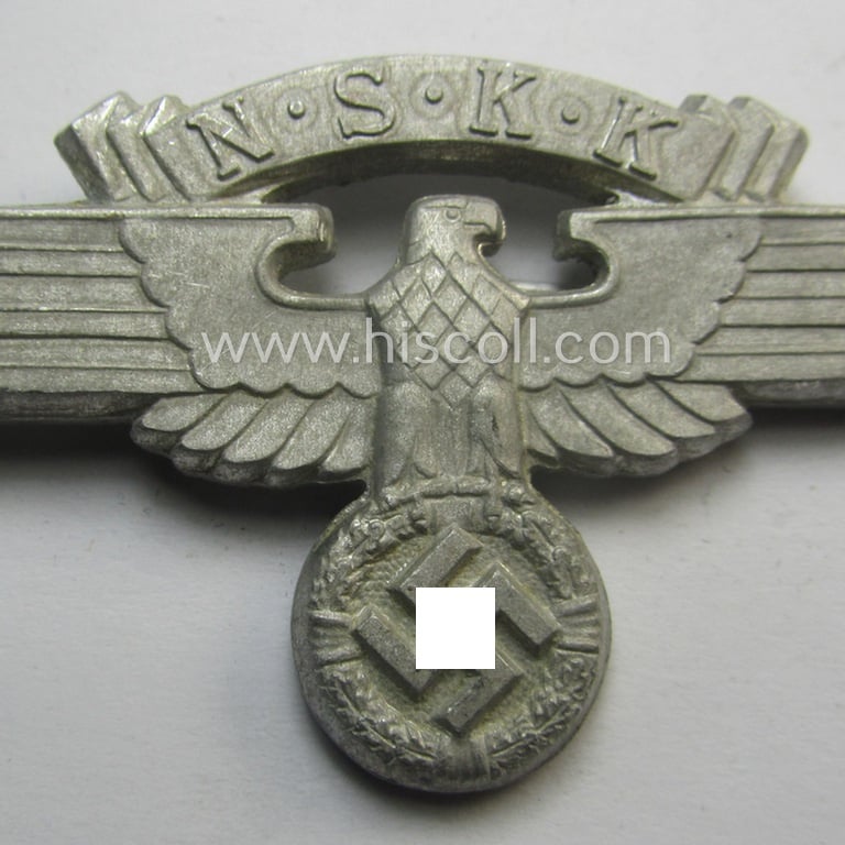 Superb - and truly scarcely encountered! - N.S.K.K. (ie. 'National Socialistisches Kraftfahr Korps') officers'-pattern visor-cap-eagle being a maker- (ie. 'RzM - M1/102'-) marked example that comes in a 'virtually mint- ie. unissued'-, condition