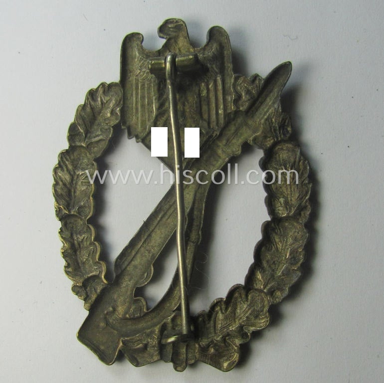 'Infanterie Sturmabzeichen in Silber' (or: silver-class infantry-assault-badge ie. IAB) being a 'Buntmetall'-based example by the: 'Otto Schickle'-company