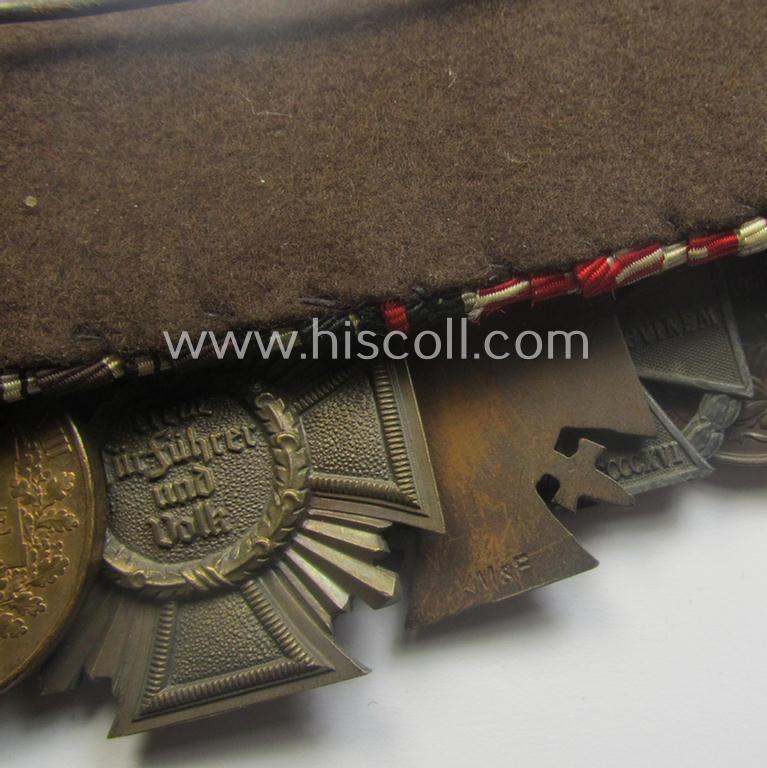 Unusually seen, 8-pieced WWI- (ie. TR- ie. N.S.D.A.P.-) related 'Ordenspange' showing amongst others: an 'N.S.D.A.P-D.A. in Bronze' (ie. '3. Stf. für 10 Jahre t.D.') and various WWI-period Austrian-(Hungarian) awards