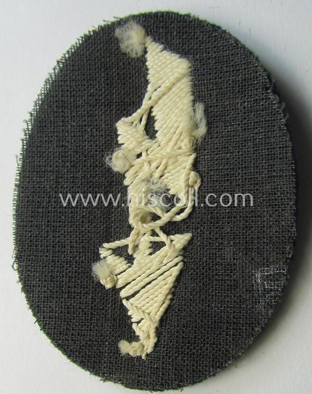 WH (Heeres) trade- and/or special career insignia ie. hand-embroidered signal-blitz (being a neatly maker-marked example as executed in white) as was intended for a soldier serving within the: 'Infanterie-Truppen'