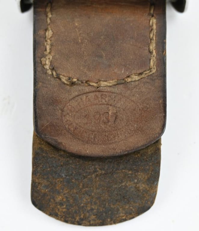 German WH Beltbuckle with leather tab 'B. Haarmann'