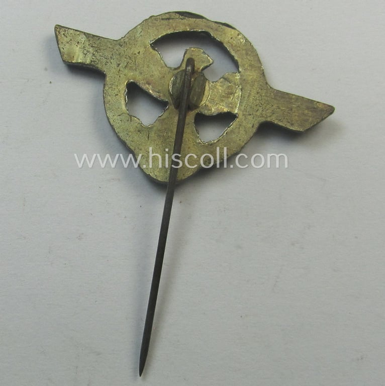 Silver-toned- (and: 'Buntmetall'-based) police ('Polizei o. Gendarmerie') so-called: 'Zivilabzeichen' (or: police civil-attire badge) being a very detailed (albeit non-maker-marked) example that comes mounted onto its long-sized pin