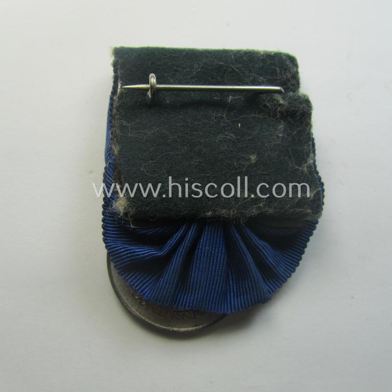 Bright silver-toned WH (Luftwaffe) so-called: 'Einzelspange' showing a: 'WH-Dienstauszeichnung 4. Stufe' (as was intended for 4 years of loyal-service) and that shows a detailed, Luftwaffe-type-eagle-device, period-attached