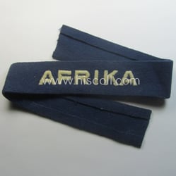 Darker-blue toned, WH (Luftwaffe) cuff-title (ie. 'Ärmelstreifen') entitled:...