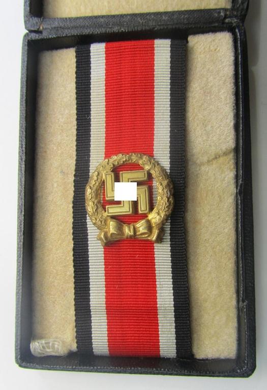 'Ehrenblattspange des Heeres' (or: army honour-roll clasp) being a 'Buntmetall'- (ie. 'Tombak'-) based example by the maker (ie. 'Hersteller') 'Otto Klein & Co.' that comes in its rarely seen black-toned etui