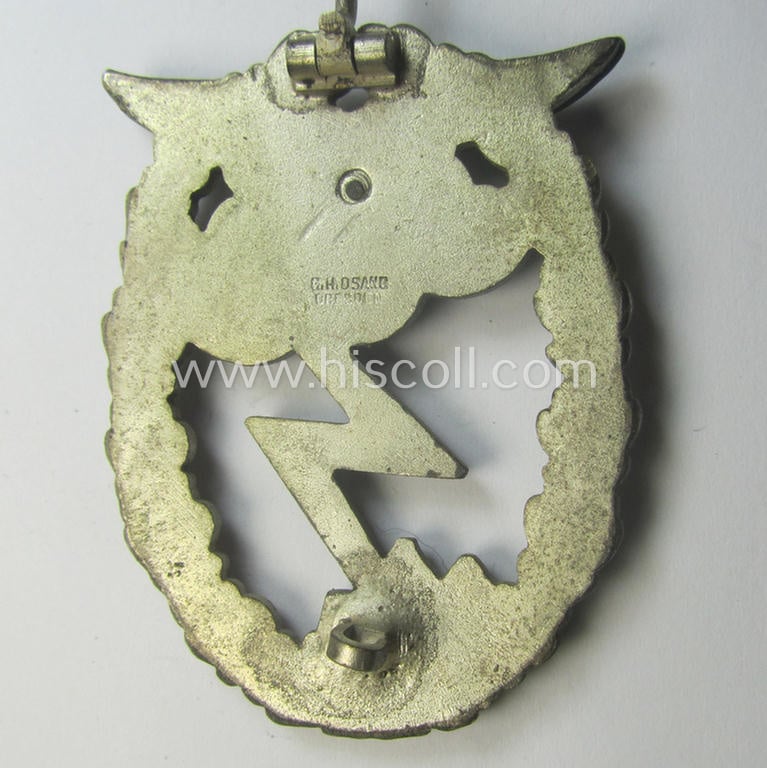Mid- (ie. later-) war-period, zinc- (ie.'Feinzink'-) based version of a WH (Luftwaffe) 'Erdkampfabzeichen' (being a maker-marked example by the 'G.H. Osang'-company having a silvered- and 'riveted' eagle-device attached)