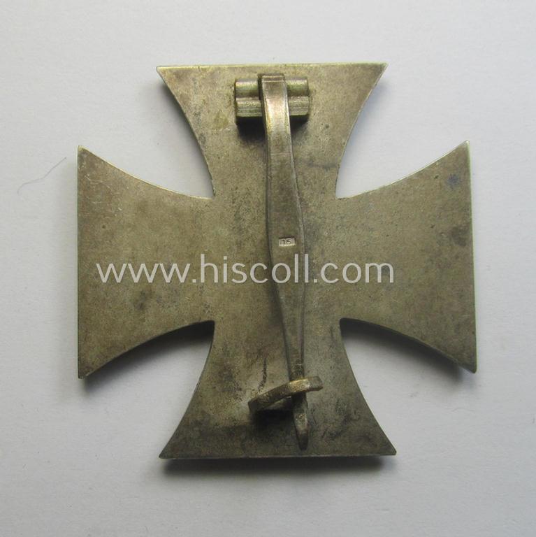 'Eisernes Kreuz 1. Kl.' (or: Iron Cross 1st class) being a typical maker- (ie. '15'-) marked example that as was produced by the Austrian maker (ie. 'Hersteller'): 'Friedrich Orth' and that comes as issued and worn
