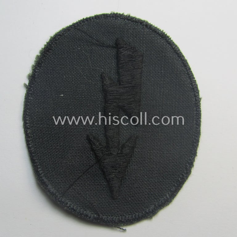 Thin-shaped- ie. 'variant'-pattern, WH (Heeres) trade- and/or special-career insignia ie. machine-embroidered signal-blitz (being a non-maker-marked example as executed in black) as intended for the: 'Pionier-Trpn.'