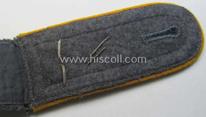 Attractive - albeit regrettably single but still scarcely seen! - WH (Luftwaffe) neatly 'cyphered', NCO-type shoulderstrap as was intended for a: 'Feldwebel der Flieger o. Fallschirmtruppen u. Mitglied einer LW-Kriegsschule'