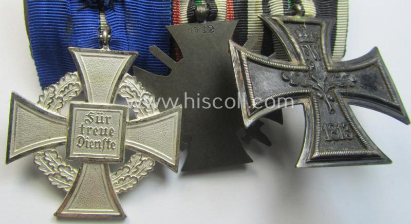 3-pieced 'WWI'- (ie. TR-) related medal-bar (ie. 'Ordenspange') resp. depicting a WWI-period: 'EK II.Kl.', a: 'FKK 1914-18' and a: 'TD-Ez. der 2. Kl.'