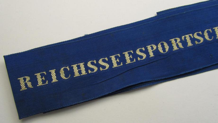 Stunning - and with certainty very rarely encountered! - Marine-HJ- (ie. 'Marine-Hitlerjugend'-) related cap-tally (ie. 'Mützenband') which is entitled: 'Reichsseesportschule I - H.J. - Gorch Fock'