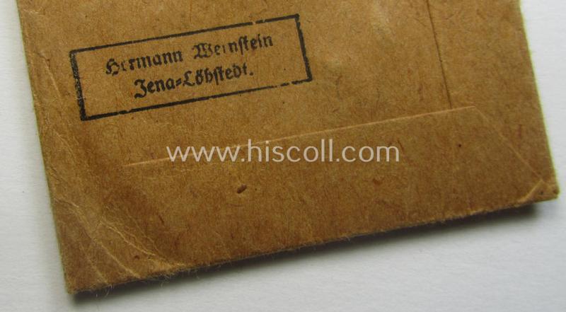 Medal-set: 'Deutsches Schutzwall Ehrenzeichen' (aka: 'Westwall'-medal) being a (typical) non-maker-marked- and/or: typical 'Buntmetall'-based specimen that comes packed in its original pouch of issue by the: 'Hermann Wernstein'-company