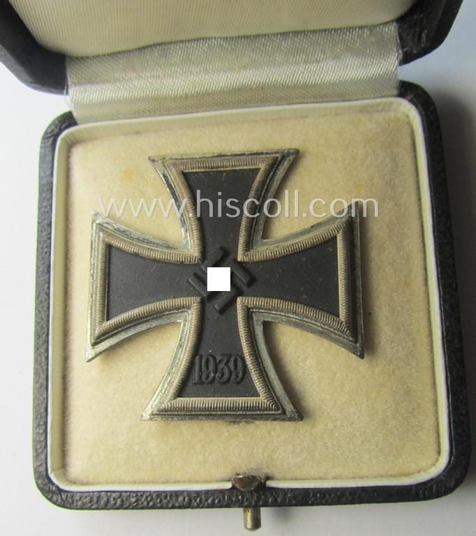 'Eisernes Kreuz 1. Klasse' (ie. Iron Cross 1st class) being an (I deem) mid-war-period produced: 'L/52'- (ie. by 'C.F. Zimmermann'-marked-) example and that comes complete in its specific etui