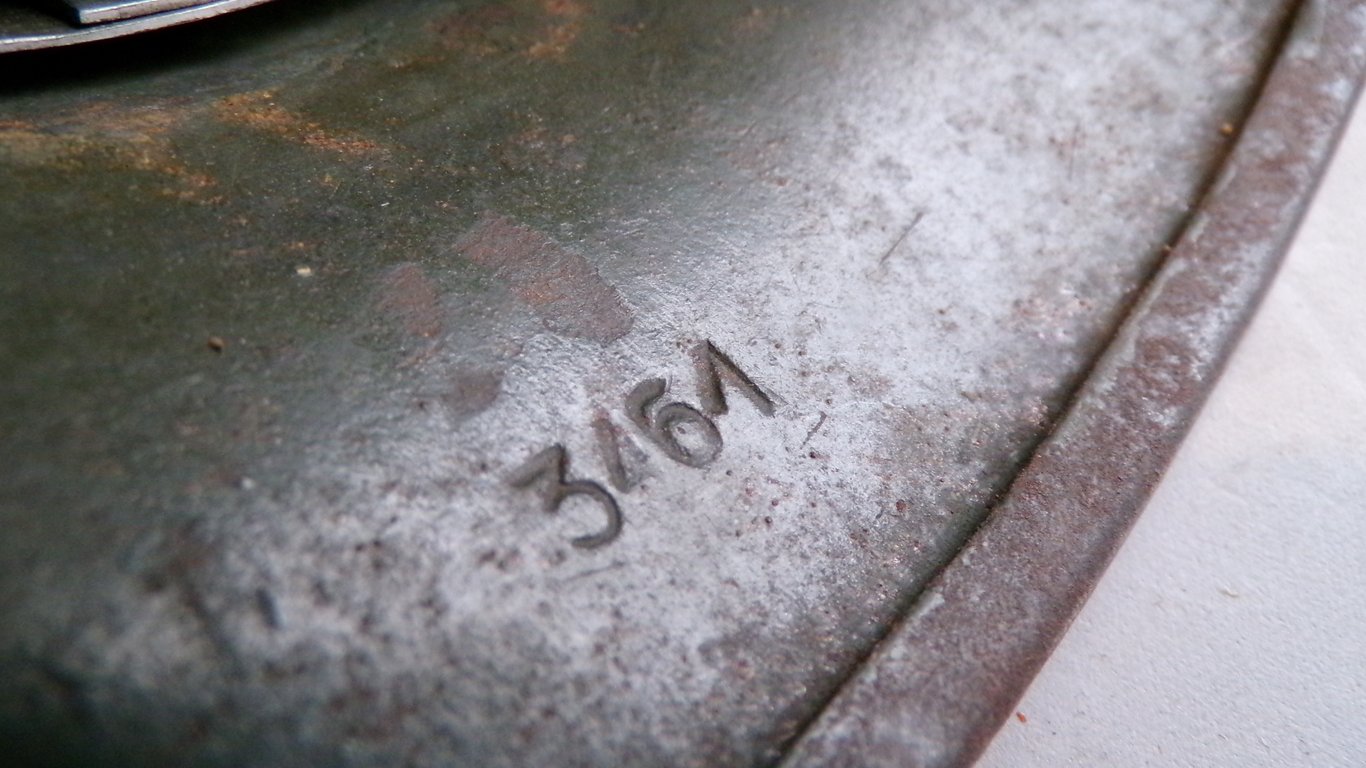 Rare small size DD M35 steel helmet