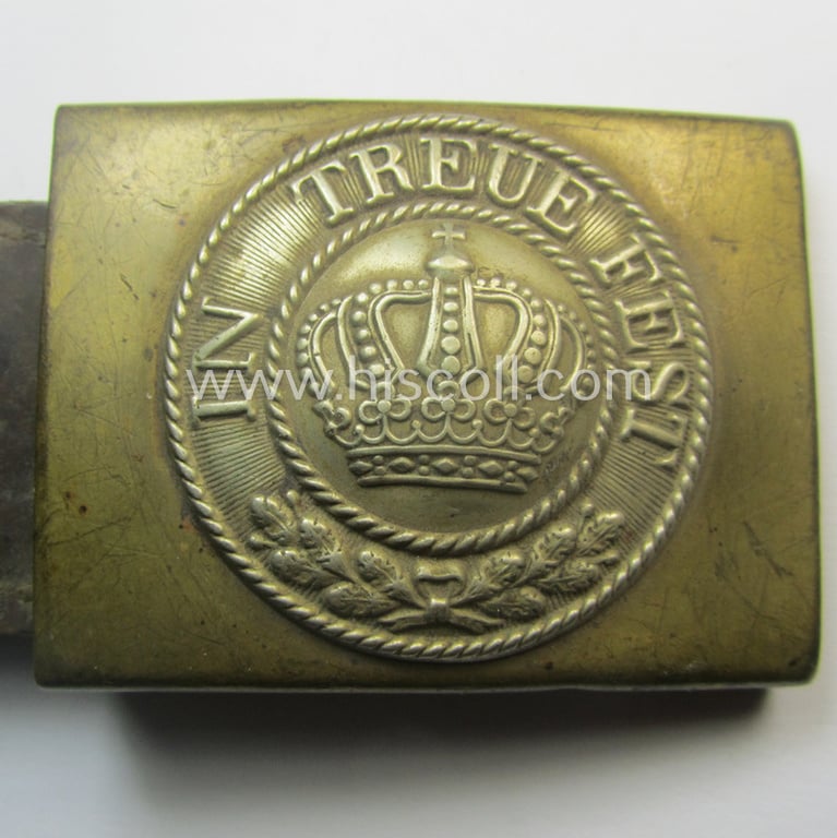 WWI-period (ie. 'Bayern'-related), copper- (ie. nickle-crome-) based EM/NCO-type belt-buckle being a moderately used example that comes mounted onto its maker- (ie. 'AWM 19 00'-) marked leather-based tab
