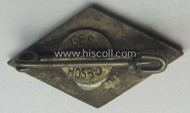 Early-pattern, HJ (ie. 'Hitlerjugend') enamelled lapel-pin (ie.: 'Raute') being a darker-red-coloured example that is void of an 'RzM'-makers'-designation (but that does show a: 'Ges.Gesch.'-patent-pending-designation)