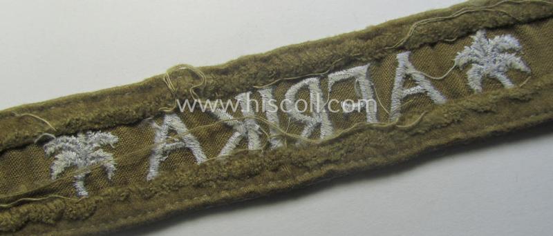 WH cuff-title (ie. 'Ärmelstreifen') entitled: 'Afrika' (being a totally non-shortened example that comes in an overall very nice- (ie. issued and clearly worn ie. once tunic-attached-), condition