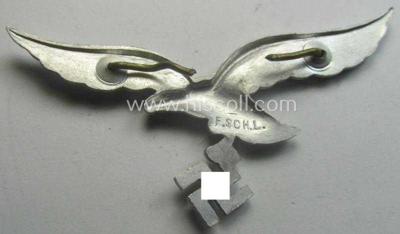 Minimally worn, WH (Luftwaffe) EM/NCO-pattern visor- (ie. 'Schirmmützen'-) cap-eagle being clearly maker- (ie. 'F.Sch.L.'-) marked example as executed in aluminium-based metal