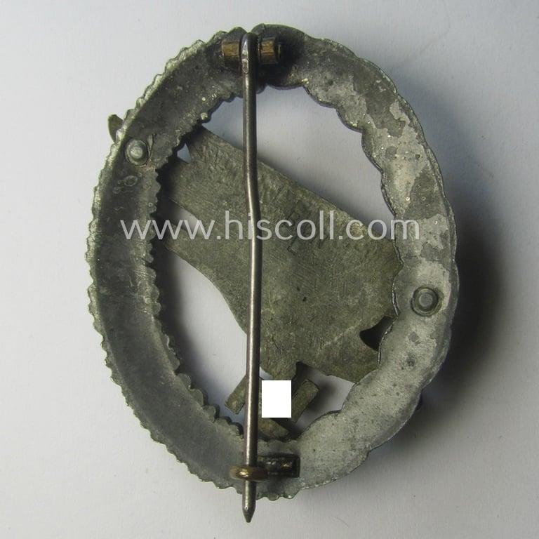 WH (Luftwaffe) 'Fallschirmschützen-Abzeichen' (or: paratroopers-jumpbadge) being a maker- (ie. 'B&N - L'-) marked- and typical zinc- (ie. 'Feinzink'-) based example by: 'Berg u. Nolte'