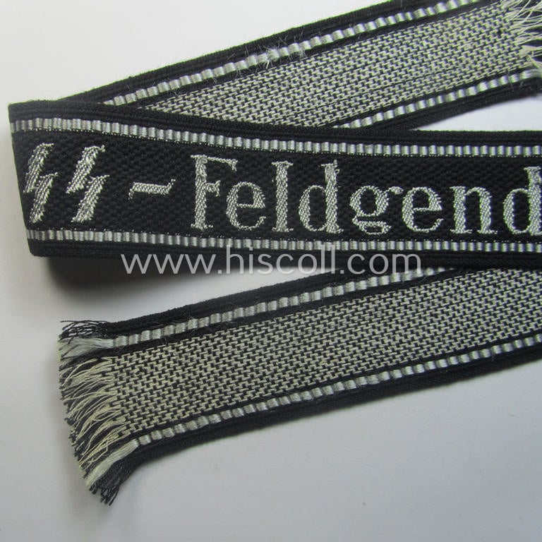 Superb - and truly rarely encountered! - example of a Waffen-SS, 'semi-BeVo'-pattern, EM- (ie. NCO-) type cuff-title (ie. 'Ärmelstreifen') as was intended for a member serving within the: 'SS-Feldgendarmerie'