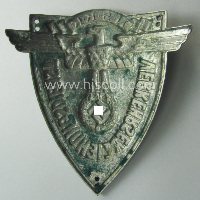 Superb - quite rarely seen and very detailed! - aluminium-based, N.S.K.K.-related armshield (ie. 'Ärmelshield') depicting the typical N.S.K.K.-eagle-device and text that reads: 'Verkehrserziehungsdienst'