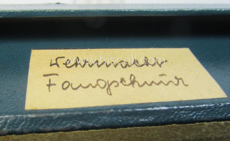 Bright-silver-toned, WH (Heeres): 'Paradefangschnur für Adjutanten' (ie. adjutants'-aiguillette) that comes stored in its period, carton box as issued