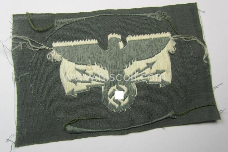 Superb, 'Postschutz' arm-badge (ie. arm-eagle) being a piece as executed in the 'BeVo'-weave-pattern and that comes in a 'virtually mint- ie. unissued', condition