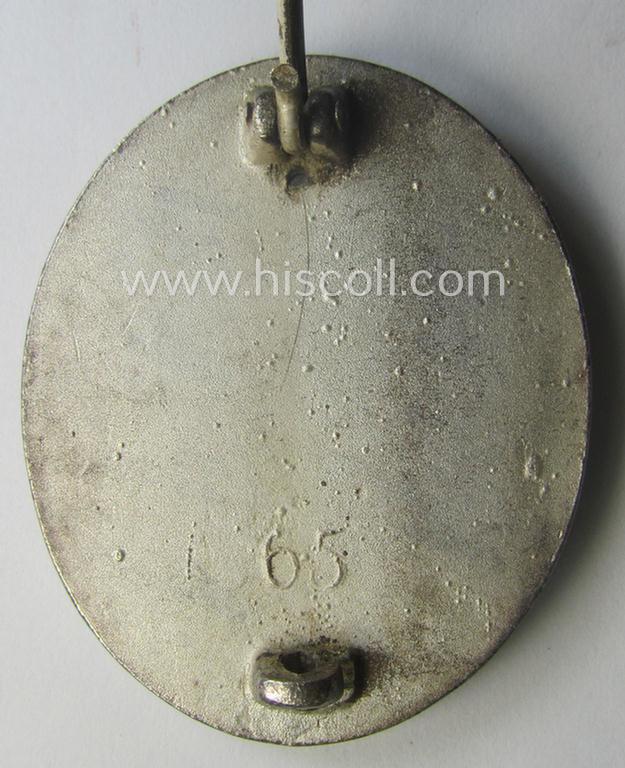 Silver-class wound-badge (or: 'Verwundeten-Abzeichen in Silber') being a maker- (ie. '65'-) marked example as was produced by the 'Hersteller' ie. maker: 'Klein u. Quenzer'