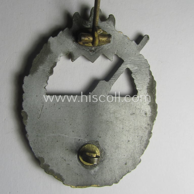 WH (Kriegsmarine) 'Marine-Artillerie-Abzeichen' being a typical non-maker-marked- and/or zinc- (ie. 'Feinzink'-) based example as was (presumably) produced by the: 'Alois Rettenmaier'-company