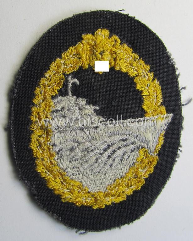 Attractive, WH (Kriegsmarine) 'Zerstörerkriegsabzeichen in Stoff' (ie. cloth-based destroyer war-badge) being a multi-coloured example that that is nicely machine-embroidered on darker-blue-coloured wool