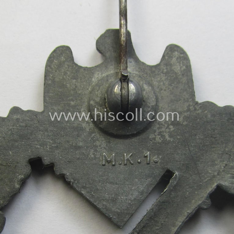 'Infanterie-Sturmabzeichen in Silber' (or: silver-class infantry-assault badge ie. IAB) being a neatly maker- (ie. 'MK 1'- or: 'Metall u. Kunststoff'-) marked example as executed in greyish-silverish-coloured 'Feinzink'