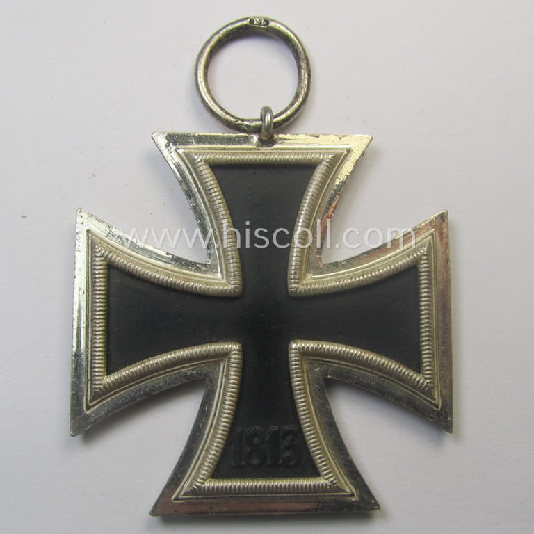 'EK II. Klasse' being a maker- (ie. '13'-) marked example that comes together with its original- and never-mounted ribbon (ie. 'Bandabschnitt') as was produced by the maker (ie. 'Hersteller'): 'Gustav Brehmer'