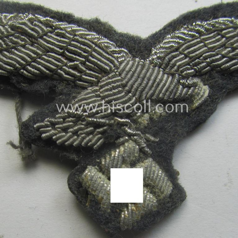 WH (Luftwaffe) officers'-pattern visor-cap-eagle (ie. 'Adler für LW-Offiziers-Schirmmütze') being a neatly hand-embroidered example of the: 'Extra Qualität' that comes in a moderately used- (ie. carefully cap-removed-), condition