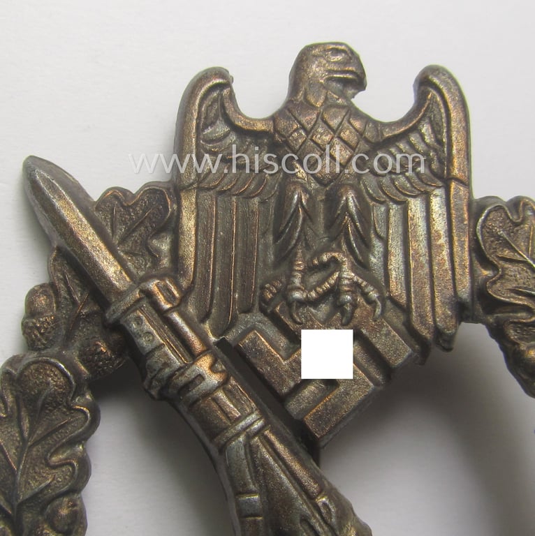 'Infanterie Sturmabzeichen in Silber' being a maker- (ie. 'W.H.'-) marked and/or quite converse, 'solid-back' example by the Austrian-based maker: 'Wilhelm Hobacher' as was executed in bright silver-coloured, zinc-based metal