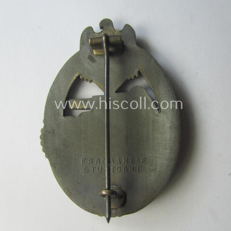 'Panzerkampfabzeichen in Bronze' (or: bronze-class panzer assault-badge or PAB) being a neat (I deem) somewhat later-war-period zinc- (ie. 'Feinzink'-) version as was procuced by the: 'Frank u. Reif'-company