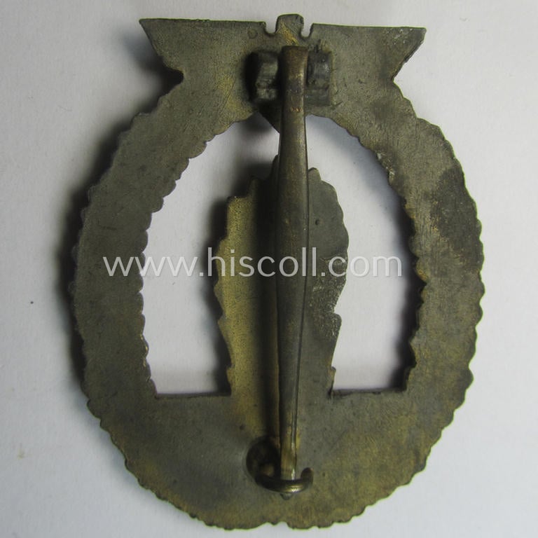 WH (Kriegsmarine) 'Kriegsabzeichen für Minensuch-, U-Boot-Jagd und Sicherungs-Verbände' being a detailed and clearly maker- (ie. 'R.K.') marked, 'Feinzink'-based example as was produced by the 'Rudolf Karneth'-company