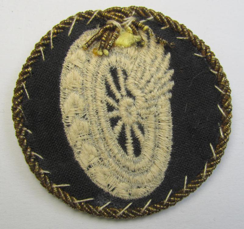 Attractive - albeit clearly used! - example of a WH (Luftwaffe) machine-embroidered, trade- ie. special-career-patch (ie. 'Tätigkeitsabzeichen') having a golden-coloured 'Goldkordel' attached as was intended for a: 'Schirrmeister o. Geräteverwal...