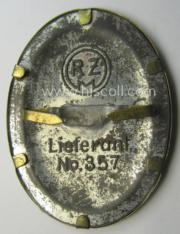 Yellowish-golden-toned- and/or partly machine-embroidered- (ie. 'BeVo'-woven-) so-called: 'DAF' (ie. 'Deutsche Arbeitsfront') cap-badge being an example that is neatly 'RzM - Lieferant No. 357'-marked on its back