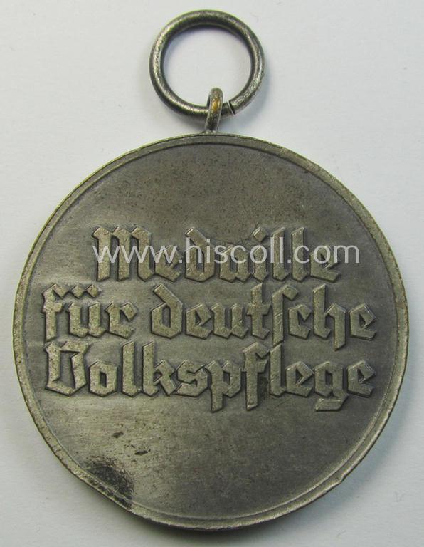 Attractive medal-set: 'Medaille für Deutsche Volkspflege' being a typical non-maker-maker-marked specimen that comes packed in its original pouch of issue by the: 'Hauptmünzamt Wien'-company as issued and/or recently found