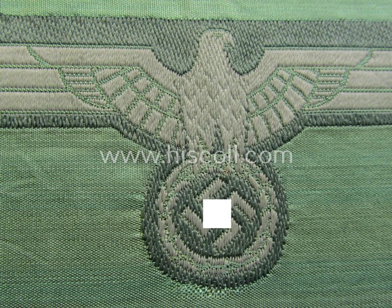 WH (Heeres) mid-war-period- and/or greyish-coloured breast-eagle of the so-called: 'M41'- (ie. 'M43'-) pattern 'Brustadler für Mannschaften u. Unteroffiziere') as executed in the neat 'BeVo'-weave pattern on a field-grey-coloured background
