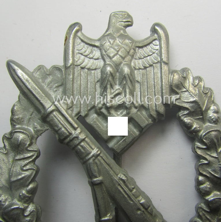 Superb, 'Infanterie Sturmabzeichen in Silber' (or: silver-class infantry assault-badge ie. IAB) being a maker- (ie. 'ÜÜ'- ie. 'E.F. Wiedmann') marked so-called: 'Lily Pad-hinge'-example as was executed in zinc-based metal