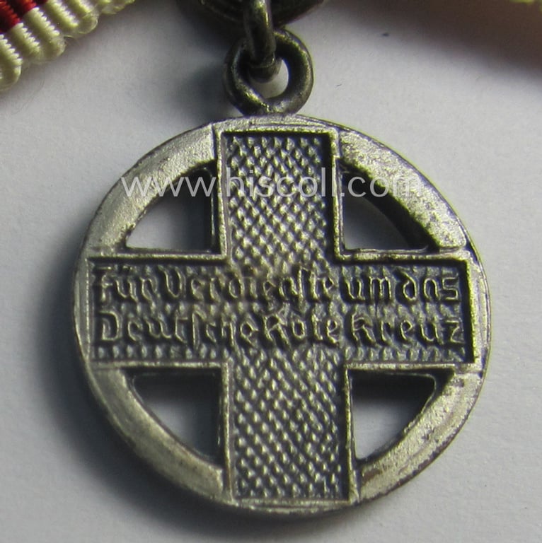 Neat - and just 17 mm. sized! - miniature lapel-pin (ie. 'Halbminiatur') depicting a: 'DRK-Ehrenzeichen des 3. Modell' (or: German Red Cross ie. 'Deutsches Rotes Kreuz' honorary-award of the third model)