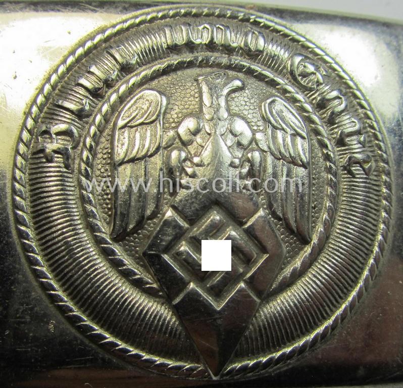 Attractive, HJ (ie. 'Hitlerjugend') bright-silver-coloured- (ie. nickle-chrome-based and early-pattern) belt-buckle being a neatly maker- (ie. 'RzM M4/44'-) marked example that comes in a just moderately used- ie. worn, condition