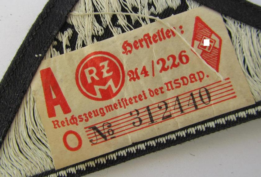 Very nice - and truly rarely encountered! - HJ/BDM ('Hitlerjugend'/'Bund Deutscher Mädel') district-triangle entitled: 'Südost Wien', still retaining its period-attached 'RzM'-etiket - very nice (IMO virtually mint-/unissued-) condition!