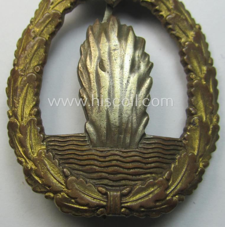 Period 'vaulted', WH (KM) 'Kriegsabzeichen für Minensuch-, U-Boot-Jagd und Sicherungs-Verbände' being a clearly maker- (ie. 'Assmann'-) marked example as executed in multi-coloured metal (ie. 'Buntmetall')