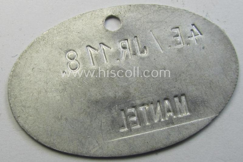 Unusual, aluminium-based WH (Heeres) 'Infanterie'-related equipment- ie. wash-tag (or: 'Wasch-Marke') bearing the superimposed text: '4.E /JR 118 - 25 - Mantel'