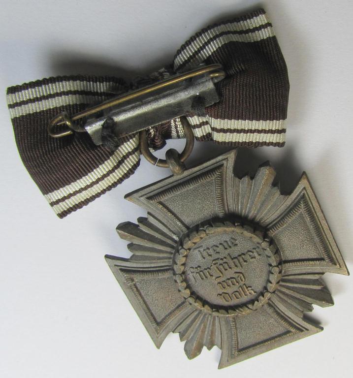 Superb, 'N.S.D.A.P. Dienstauszeichnung in Bronze' (ie. being of the '3. Stufe für 10 Jahre treue Dienste') being a non-maker-marked- (and 'heavy-weight'!) example that comes mounted onto its female-related ribbon (ie. 'Bandabschnitt')
